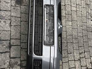 MN127035 Бампер передній Mitsubishi Colt 2003-2008 Бампер продаєця як на фото.Під покраску після професійної пайки