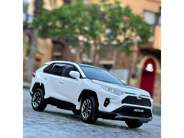 Модель автомобіля Toyota RAV4 2020 р. біла, масштаб 1:32, інерційна, світло і звук, Іграшкова модель Toyota RAV4 2020 - Фото 1