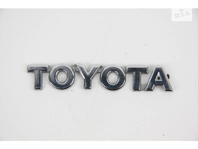 Напис кришки багажника Toyota Corolla E12 2000-2006 7544112840