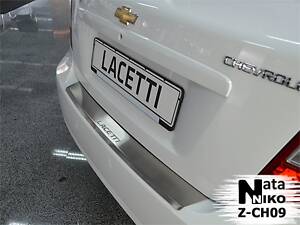 Накладка на бампер Chevrolet Lacetti 2004- с загибом седан NataNiko