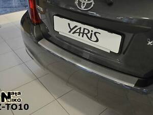 Накладка на бампер Toyota Yaris 2011-2014 с загибом без надписи NataNiko