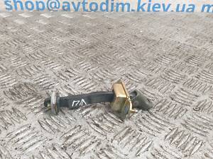 Обмежувач двері передній 61124AG000 Subaru Legacy 2003-2006