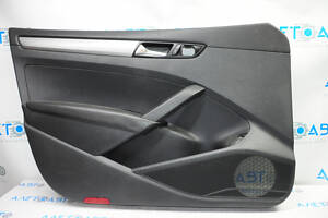 Обшивка двери карточка передняя левая VW Passat b7 12-15 USA черн с черн вставкой кожа, подлокотник кожа, молдинг серый