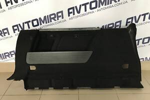 Обшивка багажника левая Opel Astra J Combi 2009-13337791