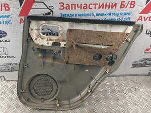 Панель обшивки задней двери левая 82901EQ300 Nissan X-Trail T30