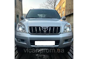 Передние фары в хромированном корпусе Toyota Prado 120 (2003-2008)