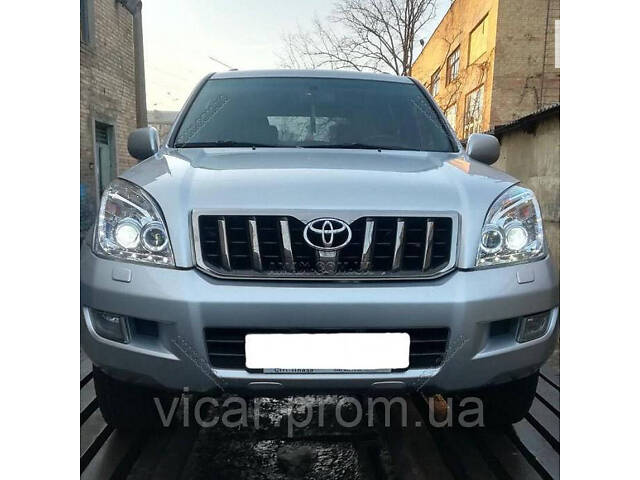 Передние фары в хромированном корпусе Toyota Prado 120 (2003-2008)