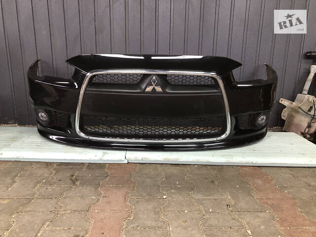 Передний бампер Mitsubishi Lancer X 2007-2015 6400D868