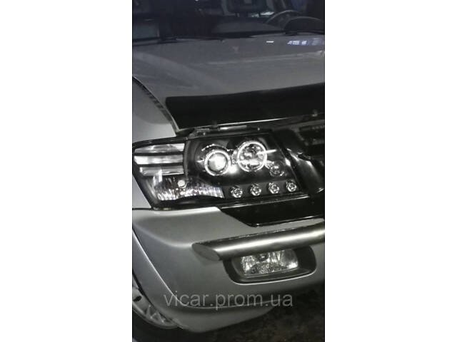 Передняя линзовая оптика, фары (черные) Mitsubishi Pajero Wagon III (2001-2006) - Фото 4