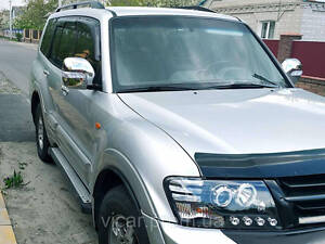 Передняя линзовая оптика, фары (черные) Mitsubishi Pajero Wagon III (2001-2006)