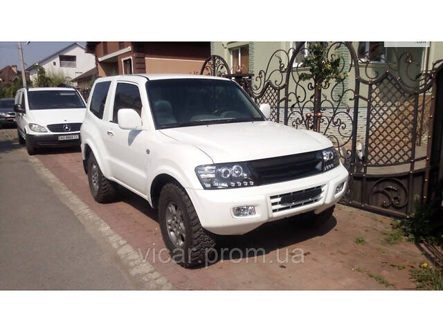 Передняя линзовая оптика, фары (черные) Mitsubishi Pajero Wagon III (2001-2006) - Фото 10