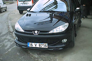 Передняя нижняя юбка (под покраску) для Peugeot 206