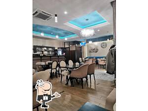 Працівник у Кафе Туркіш Сіті