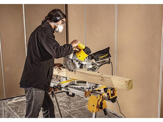 Ручная торцовочная пила с протяжкой по дереву STANLEY SM18 : 1800 Вт, глубина реза 92мм, круг 254 мм. - Фото 9