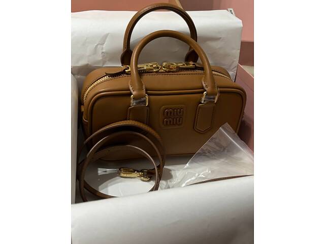 Кожаная женская сумка в трендовом дизайне. - Фото 1