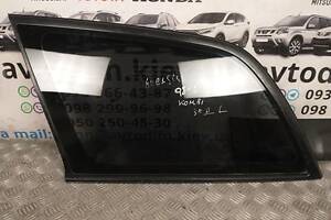 Скло кузова заднє ліве Toyota Avensis T22 універсал 6272005060