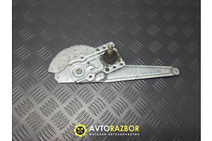 Стеклоподъемник левый задний механический B25D73560A на Mazda 323 BJ, 323F 1998-2004 год