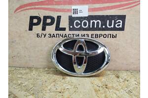 Toyota Yaris II 2009-2011 Значок эмблема хром переднего бампера 75311-0D030