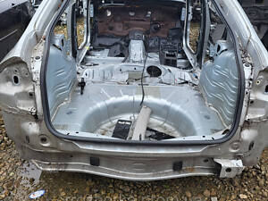 Ущільнювач задній кришки багажника Renault Laguna 3 хачбек 07-15р. (ляди Рено Лагуна ІІІ)