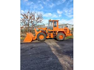 Услуги фронтального погрузчика.