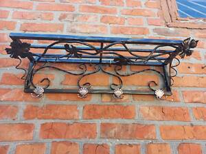 Вішалки з кованими елементами.