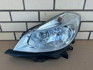 Подержанная фара левая (дорестайлинг) Renault Clio 3 (2005-2009г.) (ДЕФЕКТ ДВУХ КРЕПЛЕНИЙ)