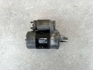 Подержанный стартер Suzuki Wagon R (1997-2000 г.в) - 1.0L