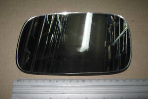 Вкладыш зеркала левого VW PASSAT B3 88-93 (TEMPEST). 051 0606 435