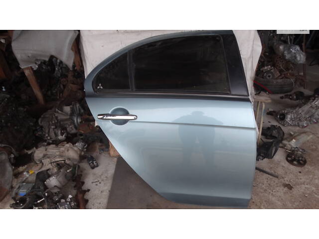 Вживаний двері задні для Mitsubishi Lancer X 2007,2018 Дверка під покраску сторона ПРАВА ціна за голу дверку.