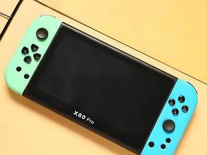 Игровая портативная консоль XPRO с 7 HD экраном и 20000+ играми (43809-X80_2079)