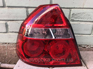 Задний фонарь левый chevrolet aveo t250 (шевроле авео) 2006-2012. (TYC)
