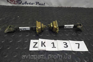 ZK0137 804302f000 обмежувач ходу дверей перед R Nissan P12 01-07 40-01-02