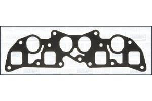 13079400 Прокладка колектора впуск/випуск Almera/Primera 2.0 D 91-02