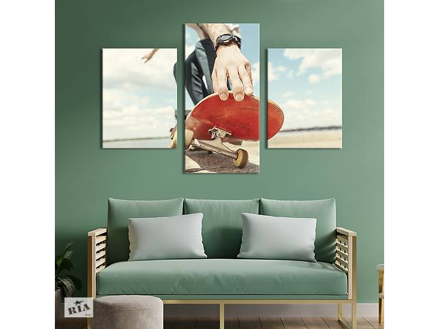 Картина на холсте KIL Art для интерьера в гостиную Парень на красной доске для скейтборда 66x40 см (499-32)