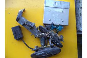 Б/у блок управления двигателем для Daewoo Lanos (1,5) (1997-2008) (16246137) (FR) (мозги+замок+ручки передние в дверь)
