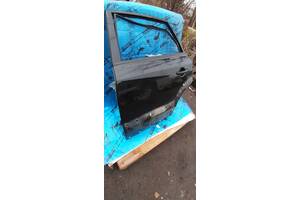Б/у Дверь задняя левая Hyundai Tucson 2004-2012 голая черная