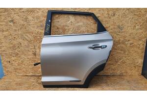 Б/у Двері задні ліві Hyundai Tucson 2015-2021 голі срібло