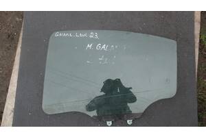 Б/у стекло двери для Mitsubishi Galant 1997-2002 заднє ліве