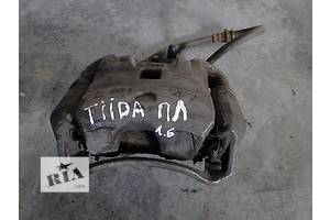 Суппорт/супорт передній лівий Nissan TIIDA Versa 1.6 1.8 04-12р. 41011EM10A / 410111FE0A