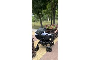 Детская коляска из эко кожи