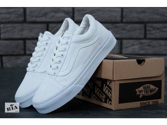 Triple white store vans