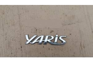 Эмблема YARIS на крышку багажника 7544252210 Toyota Yaris 1999-2009 1.3 Тойота Ярис 1999-2009 1.3