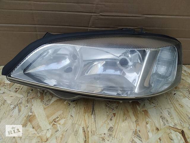 Фара левая Opel Astra G 1998-2005 Hella без двух креплений 24439602LH