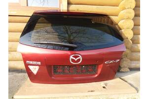Крышка багажника в сборе как на фото Mazda CX-7 2006-2010 (БОРДО Металлик Кнопка Без Камеры) 281119