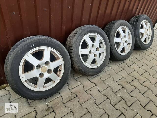 Диск с шиной 195/60 R15 Mitsubishi Lancer IX