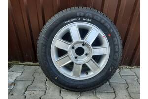 Диск із шиною 205/60 R15 Kia Magentis I