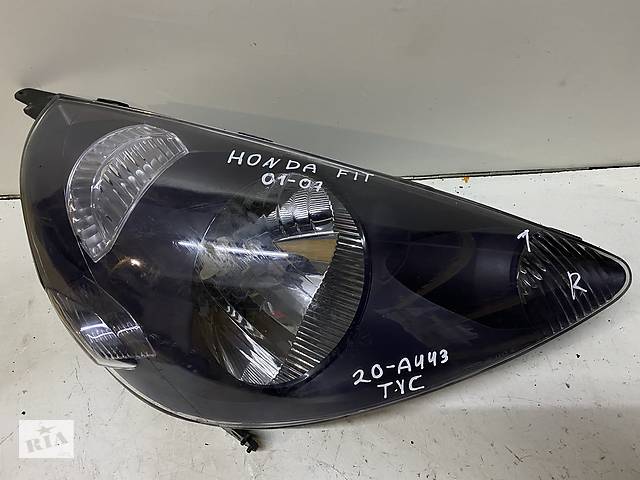 Подержанная фара левая для Honda FIT 2001-2007.