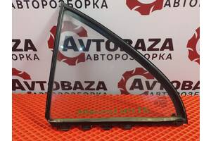 Скло дверей заднє ліве для Toyota Avensis хетчбек 2003-2008