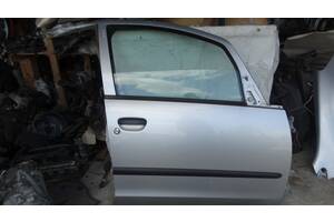 Вживана ДВЕРКА двері передні для Mitsubishi Colt 2003, 2008 Сторона права ціна за голу дверку під покраску. 5D Див фото.