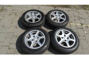 Вживаний диск з шиною для Mitsubishi Colt ContiWinterContact TS800 Continental 175/65R14 82T Резина зимова.